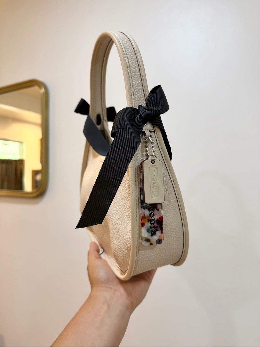 Coach Cream Pebbled Leather Mini Top-Handle Bag with Black Ribbon